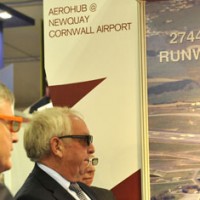 Business Minister, Mark Prisk and Chris Pomfret, Chairman of the Cornwall & Isles of Scilly Local Enterprise Partnership, watching a video of the Aerohub wearing 3D glasses